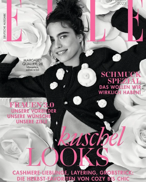 Elle magazine cover featuring Margaret Qualley, November 2023 issue, in a black and white floral jacket, and floral background. 