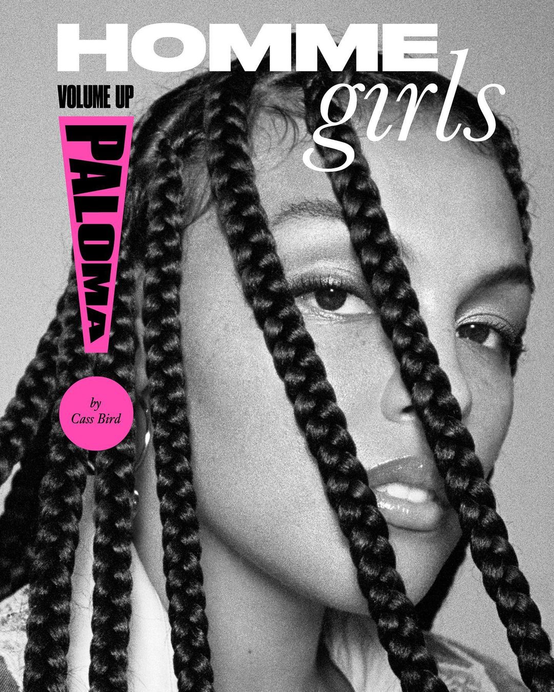 Magazine cover featuring a Black model with braids, showcasing a close-up portrait with visible text including 'HOMME girls' and 'PALOMA'.