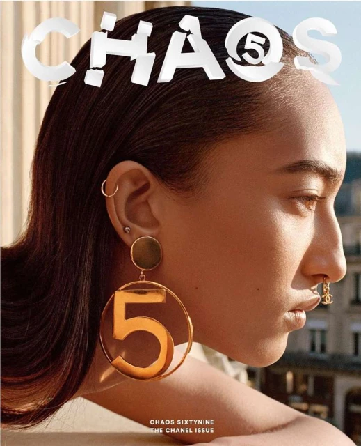 Fashion magazine cover featuring a woman wearing gold earrings and nose ring, with the magazine title 'Chaos' visible.