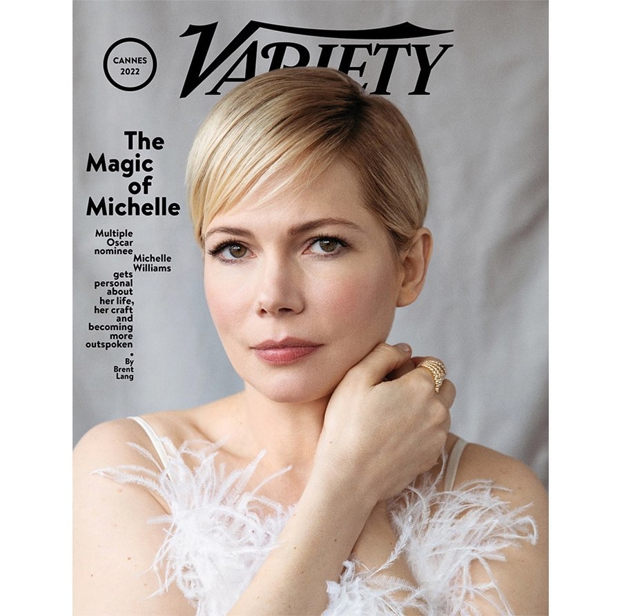 Michelle Williams on Variety cover. Close-up of woman with blonde hair wearing white dress with feather details, against a light gray backdrop.