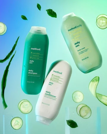 Three 'Method' brand product bottles with daily zen scent, alongside floating cucumber slices and green leaves on a blue to green gradient background.