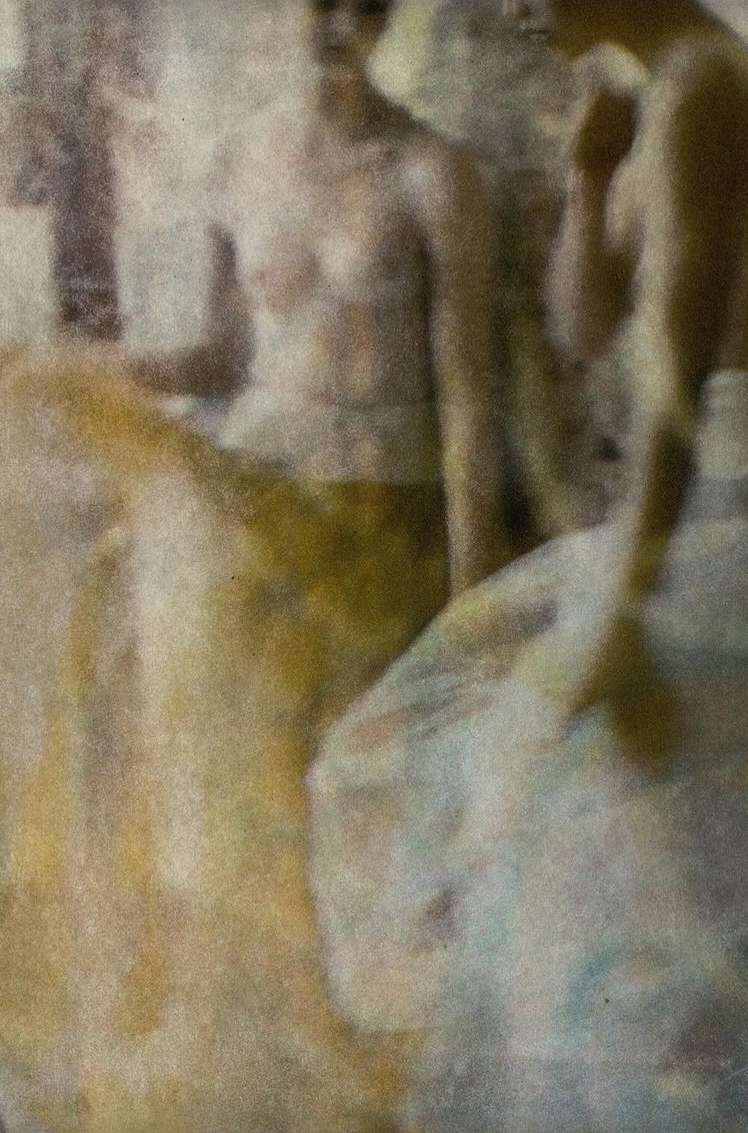 Blurred vintage image with three humans in a photo, evoking a nostalgic, soft, and timeless feel through artistic photography.