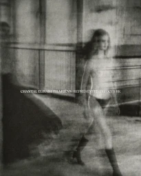 Monochrome portrait of a woman walking with motion blur in an interior space by Chantal Elisabeth Ariens
