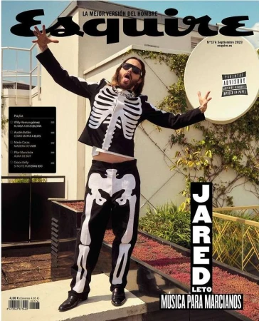 Esquire magazine cover featuring Jared Leto in skeleton-themed outfit, arms raised, set against an outdoor urban backdrop with greenery.