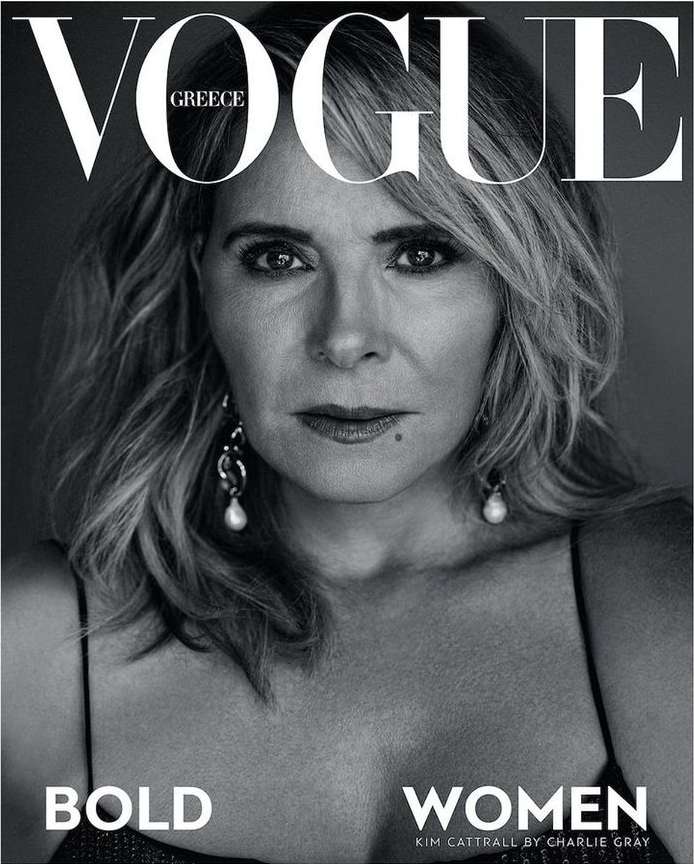 Vogue Greece cover featuring a portrait of Kim Cattrall, the actress looks directly at the camera with silver earrings and blonde hair.