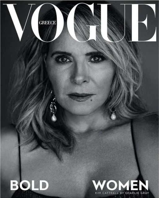 Vogue Greece cover featuring a portrait of Kim Cattrall, the actress looks directly at the camera with silver earrings and blonde hair.