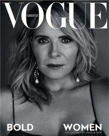 Vogue Greece cover featuring a portrait of Kim Cattrall, the actress looks directly at the camera with silver earrings and blonde hair.