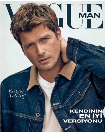 Kivanc Tatlitug on a magazine cover wearing a blue denim jacket with brown collar over a white t shirt
