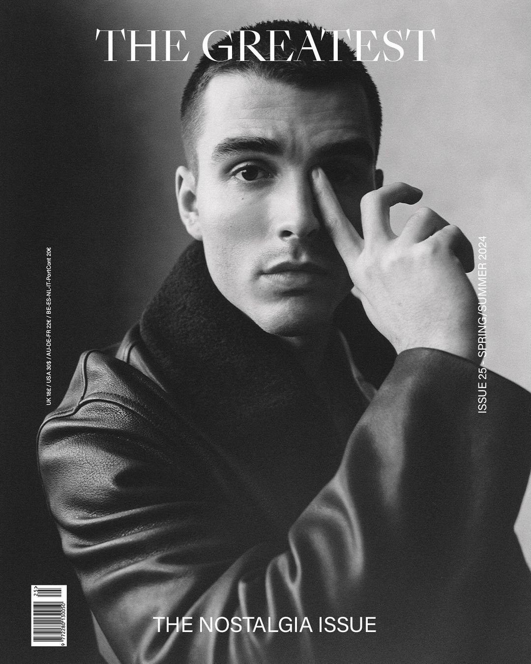 Monochrome portrait of a young man wearing a dark leather jacket with hand near his face for The Greatest magazine cover by Charlotte Hadden