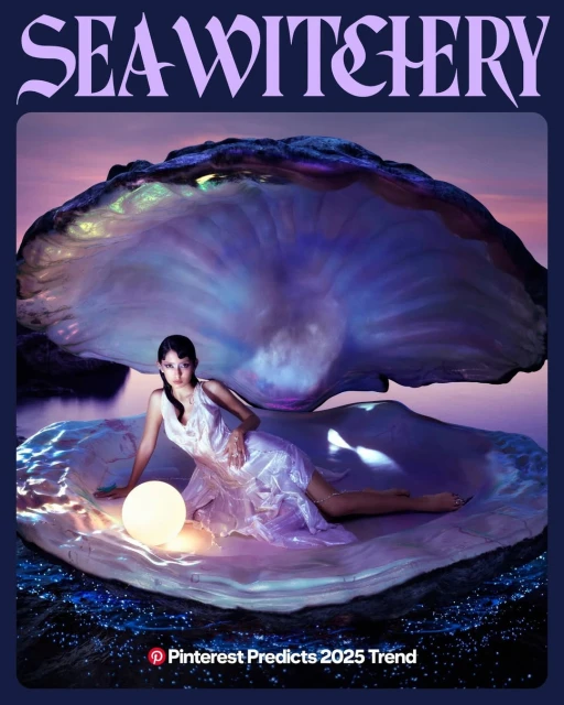 A woman in a pearlescent dress rests in a luminous clam shell with a glowing orb, set against a gradient of pink and purple skies.