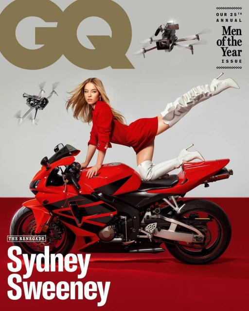 Magazine cover featuring Sydney Sweeney posing on a red motorcycle, accessorized with white thigh-high boots and drones in the background.