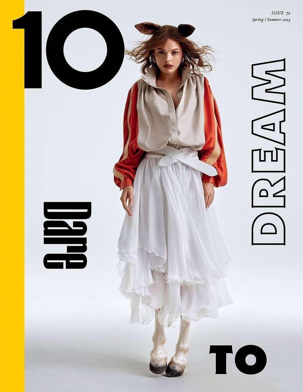 Magazine cover featuring a young woman with horse ears and horse hoof shoes, posing in a beige and orange top and white layered skirt.