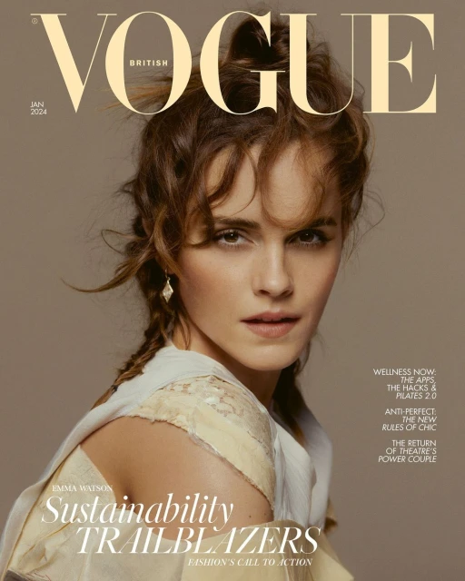 Emma Watson on British Vogue cover, January 2024. Brunette poses in lace-trimmed dress, natural makeup, hair in braided updo, diamond earrings.