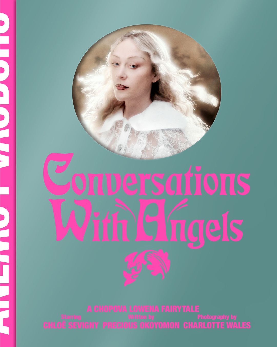 A magazine cover features a woman's portrait in a circular frame, set against a teal backdrop with pink text, evoking a dreamy, artistic mood.