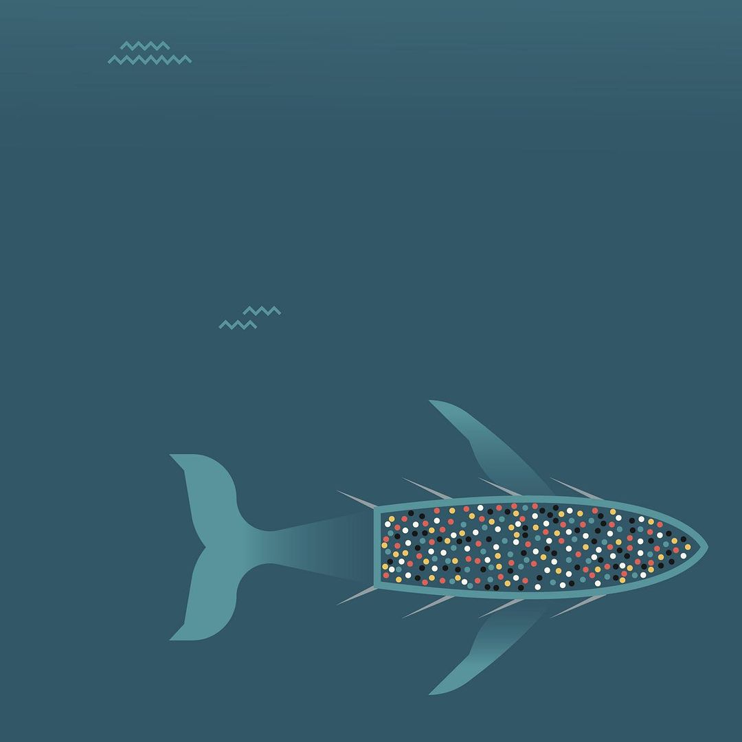 Stylized whale illustration in a blue underwater scene, showcasing a design with a geometric body filled with colorful dots.