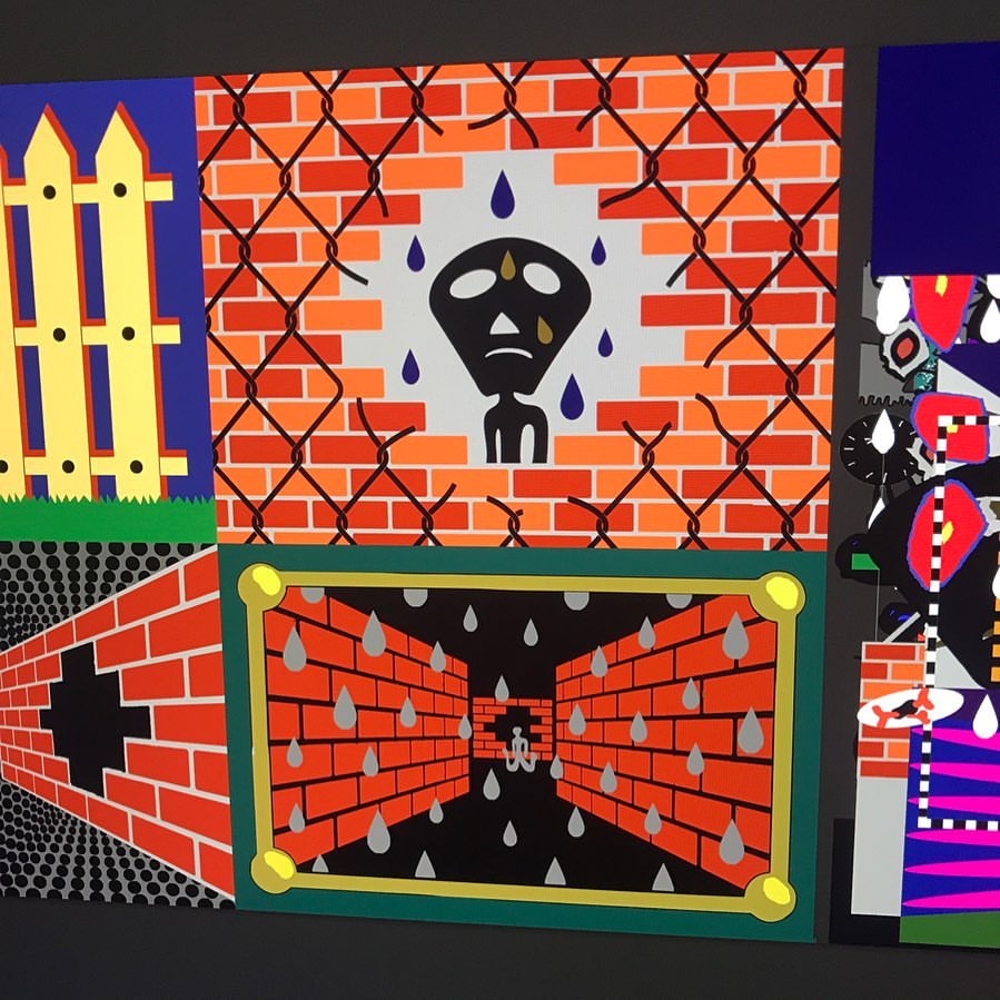 Colorful graphic art featuring brick walls, fences, and stylized figures with geometric and abstract patterns on a dark background.