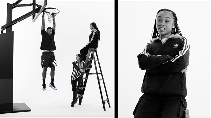 Black-and-white studio shot of four people in sports apparel, including a basketball player hanging from a net, and a girl in a tracksuit.