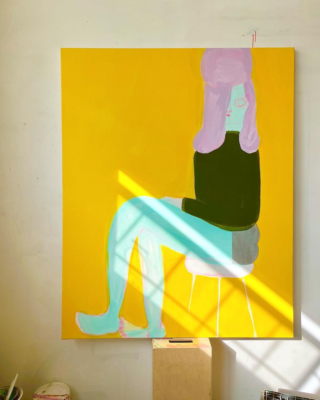 Art painting of an abstract figure with lavender hair sitting on a stool, set against a yellow background with sunlight casting shadows.