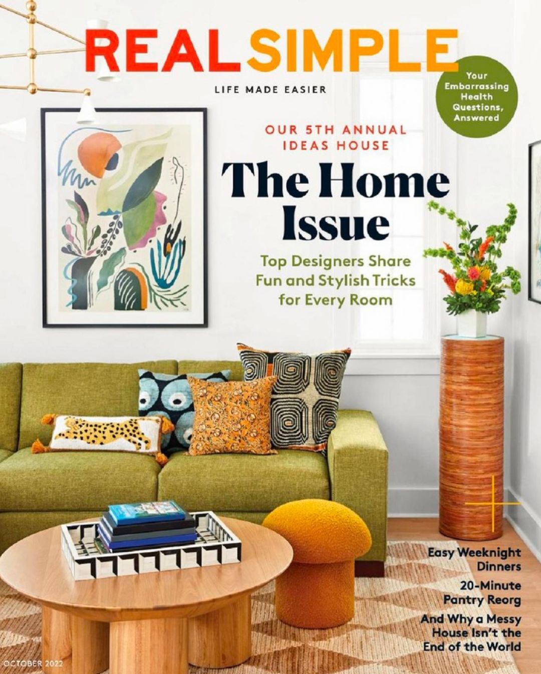 Real Simple magazine cover featuring a green sofa, art, and modern décor; text reads 'The Home Issue' and 'Life Made Easier'.