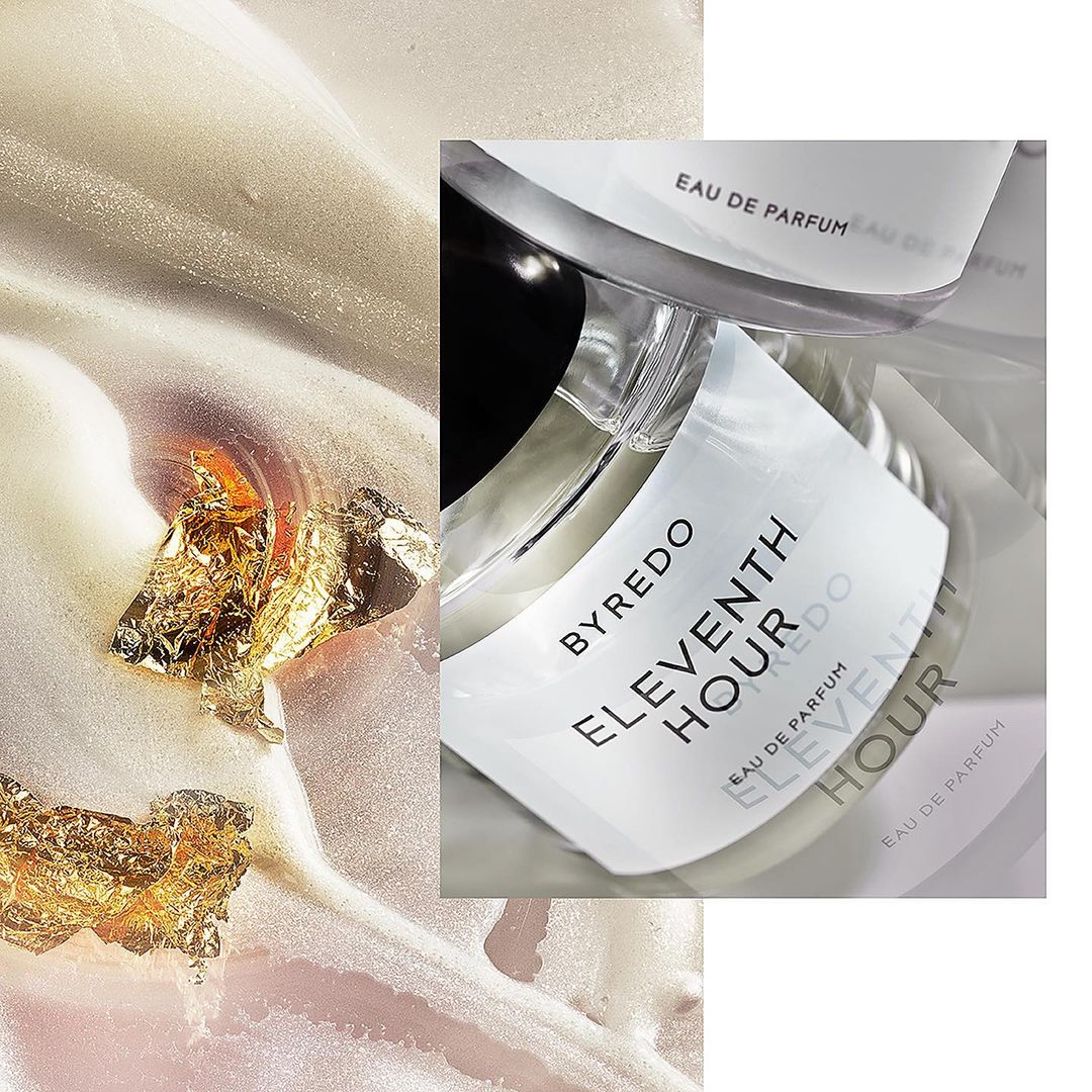Byredo Eleventh Hour perfume bottle close-up on a textured surface with gold accents, presented in a studio setting.