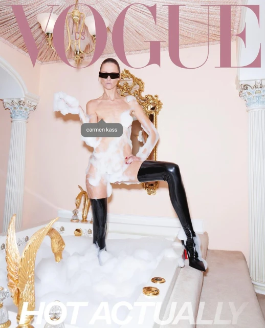 Vogue cover featuring a model in a bathtub filled with bubbles, wearing black thigh-high boots and sunglasses in an indoor setting.