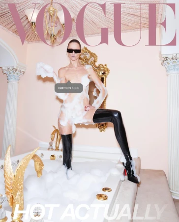 Vogue cover featuring a model in a bathtub filled with bubbles, wearing black thigh-high boots and sunglasses in an indoor setting.