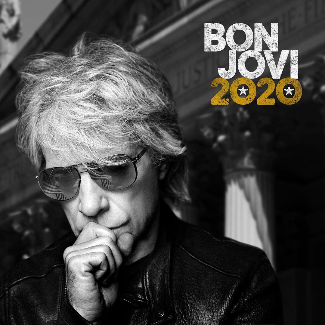 Black and white portrait of Jon Bon Jovi in sunglasses and jacket with hand to face, and the band's logo in the background.