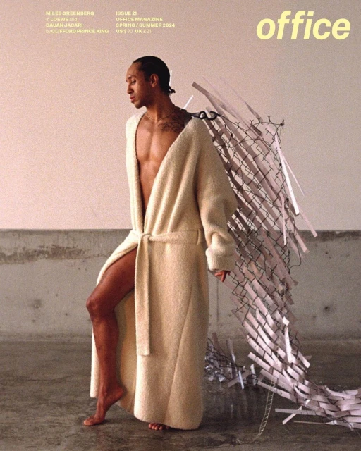 Magazine cover featuring a bare-chested man in a bathrobe and shredded paper wings, with 'office' magazine text. Fashion editorial.
