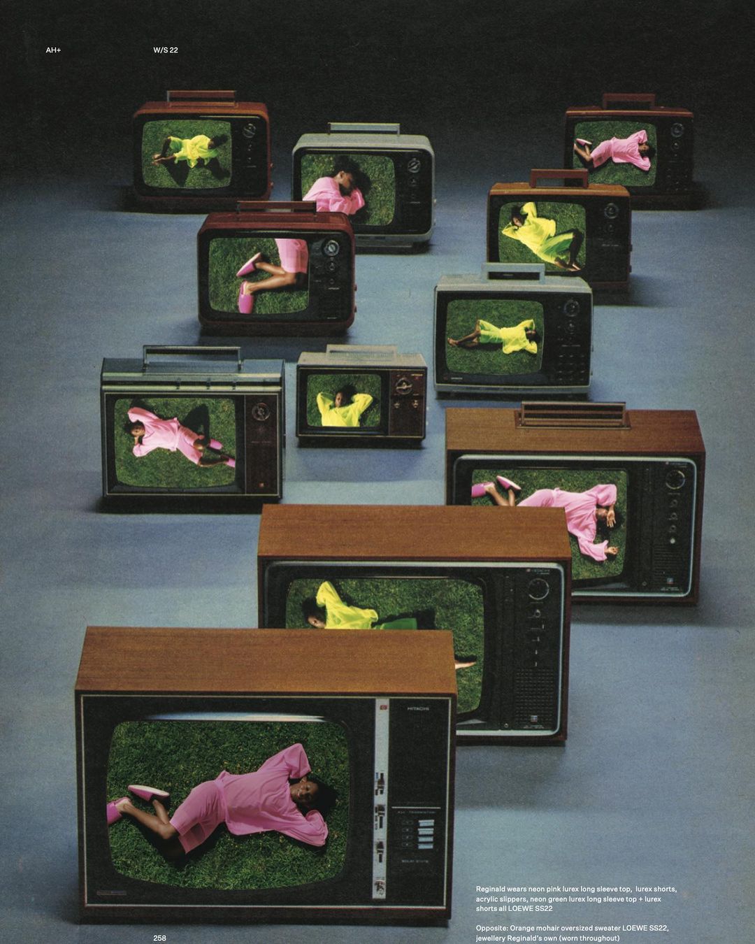 Retro TV sets display people lying on artificial grass screens, creating a surreal, vintage-themed composition on a gray background.