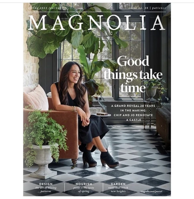 Magazine cover features Joanna Gaines seated indoors with plants, promoting 'Magnolia' spring journal issue, showcasing home and garden themes.