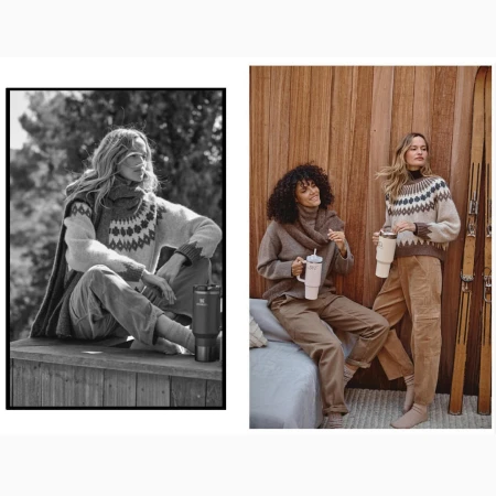Two women in warm winter sweaters and cargo pants holding insulated travel mugs in an outdoor setting