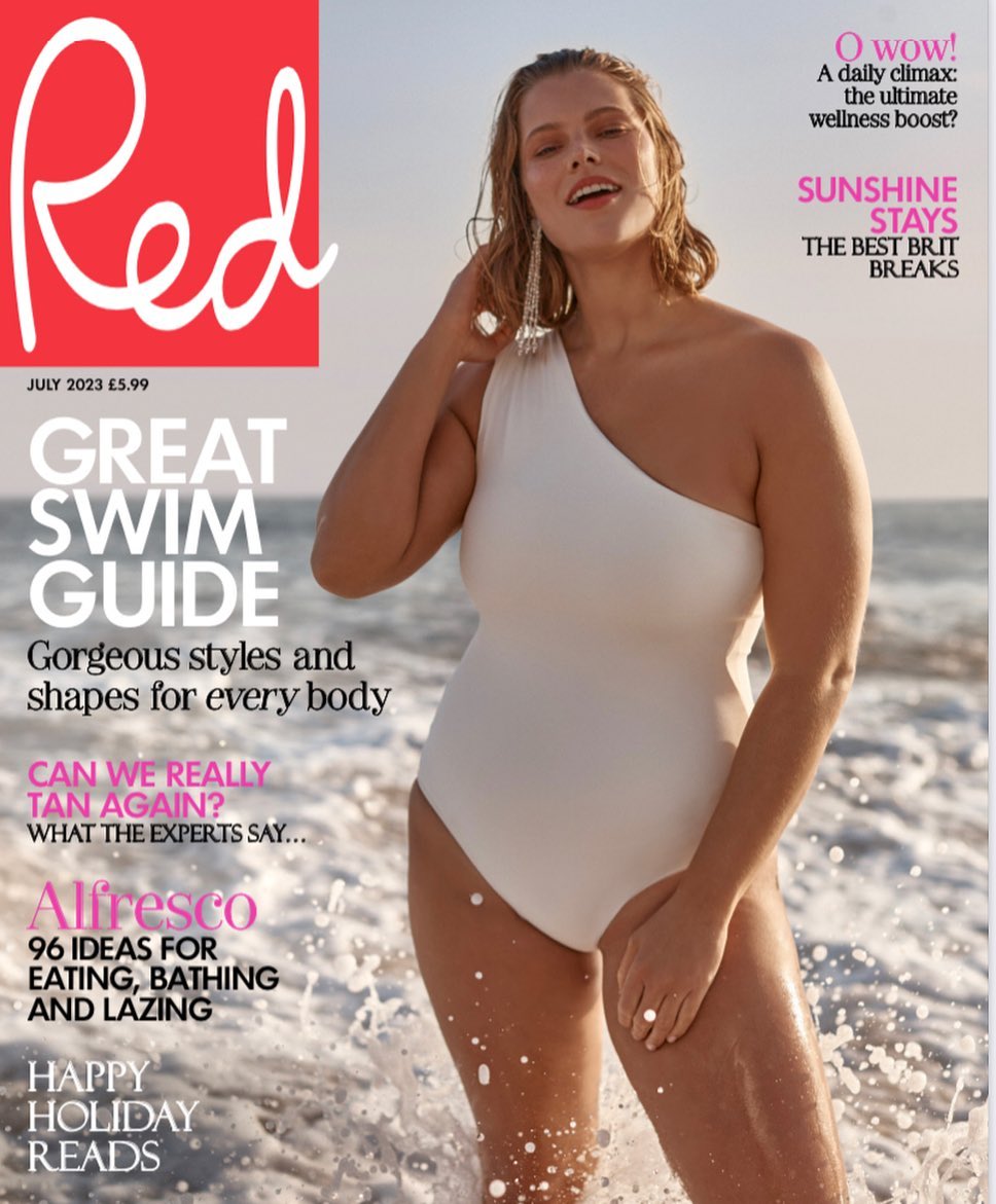 Magazine cover featuring a woman in a white bathing suit standing on a beach with ocean waves. Red magazine July 2023 issue.