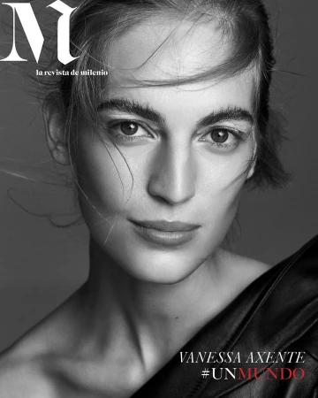 Close-up monochrome portrait of Vanessa Axente with loose hair and dark top against a neutral background.