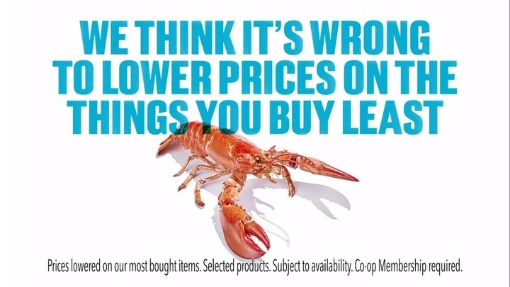 Promotional image featuring a cooked lobster over a white background, accompanied by text highlighting a pricing strategy.