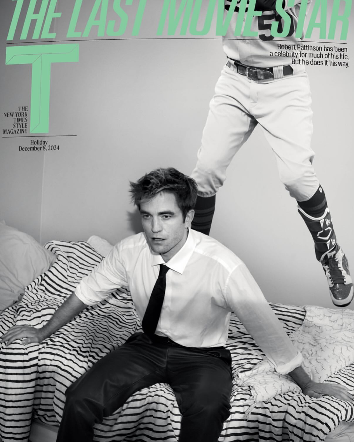 Magazine cover featuring Robert Pattinson sitting on a bed with a baseball player superimposed behind him in black and white tones.