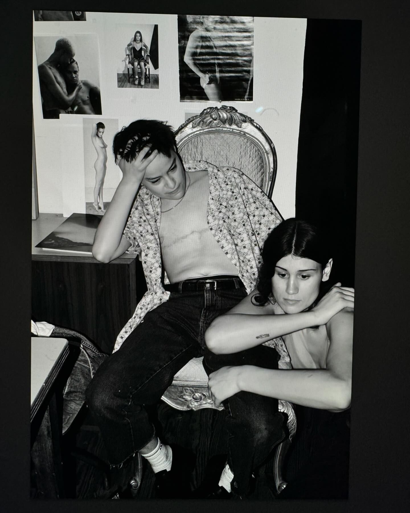 Black and white portrait of two young people indoors by photographer Collier Schorr