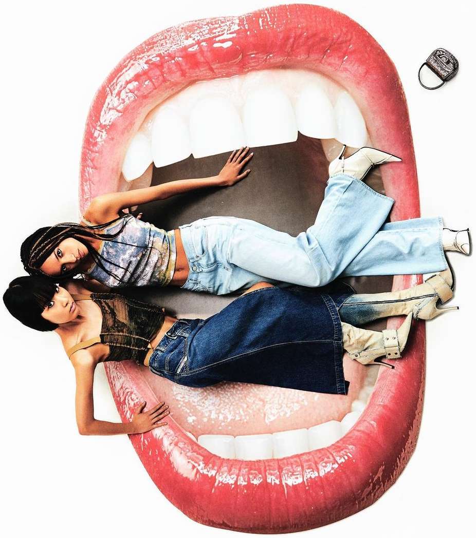 Two women laying in giant mouth wearing denim and white boots in a collage style fashion shot with white background and small purse floating.