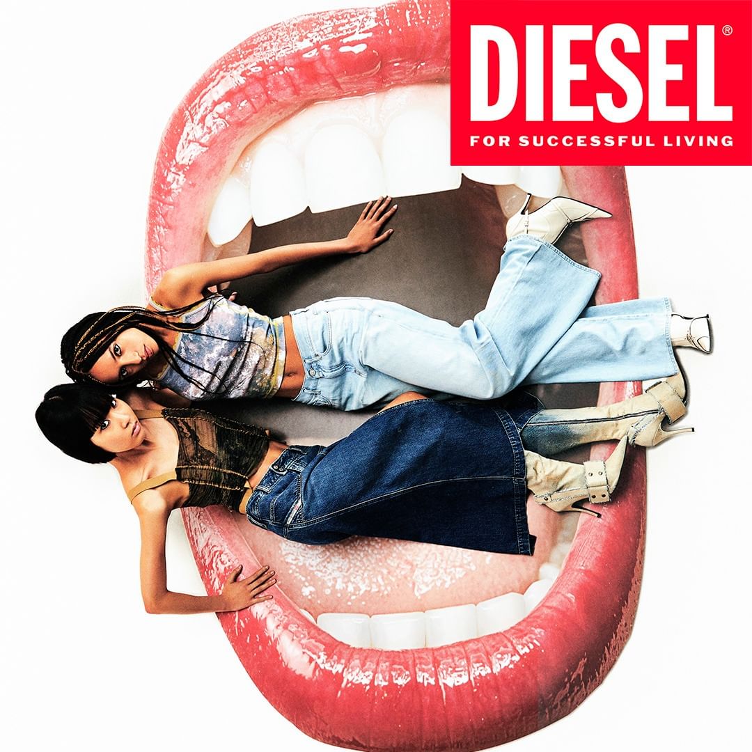 Two models posing inside a giant open mouth graphic against a white background with a Diesel logo
