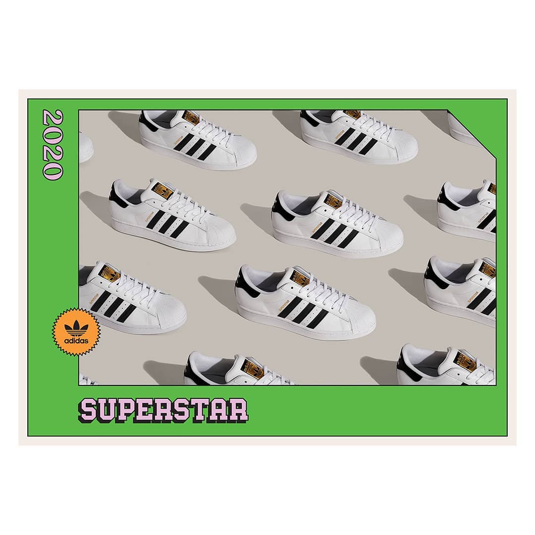 Adidas Superstar sneakers in a repeating pattern on a tan background, framed by a green border with Adidas logo and '2020' text.