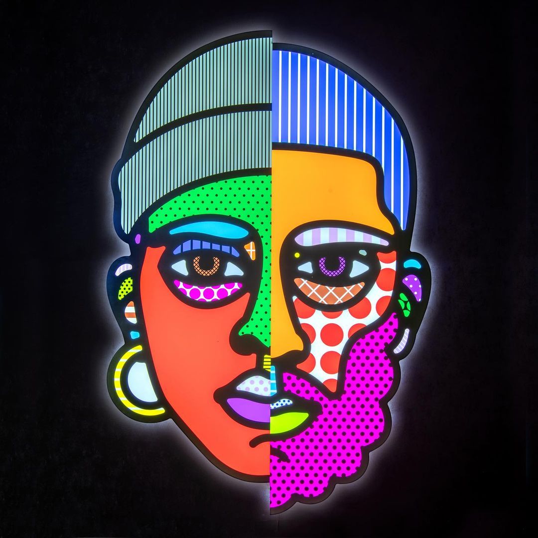 An animated face illustration featuring vibrant colors, geometric patterns, and halftone dots against a stark black background.
