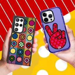 Two hands holding two different smartphone cases featuring colourful geometric and peace sign patterns by Craig & Karl.