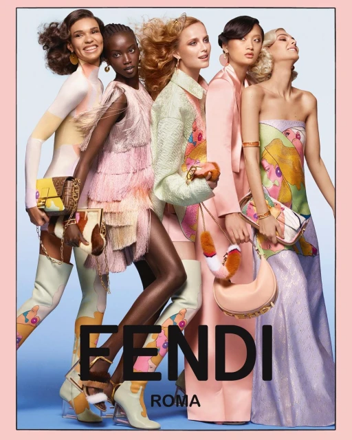 Fendi fashion ad features five diverse women in stylish outfits, pastel colors, and designer handbags against a light blue background.