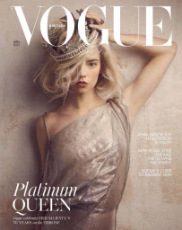 Anya Taylor-Joy wearing an ornate crown and metallic dress on a magazine cover photographed by Craig McDean.