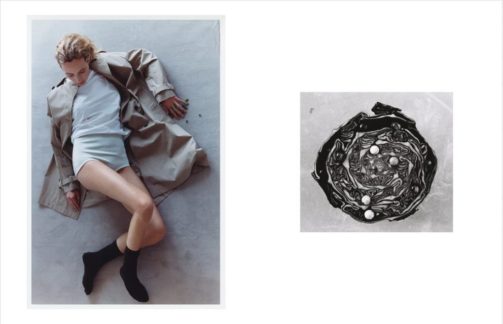 Adult woman in undergarments and trench coat lying on the floor next to an image of a cut red cabbage on white background.