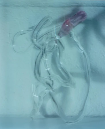 Abstract art: A flowing, transparent material with a pink mass is set against a pale blue background in a contemporary style.
