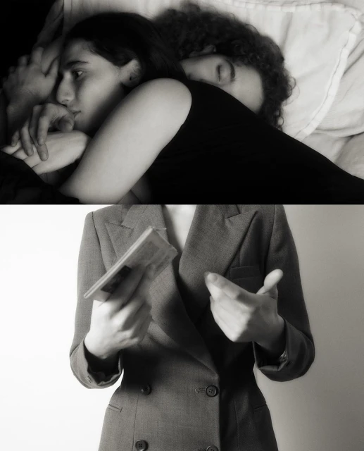 Black and white image of two adults in bed and a cropped view of an adult holding a book and gesturing with the other hand.