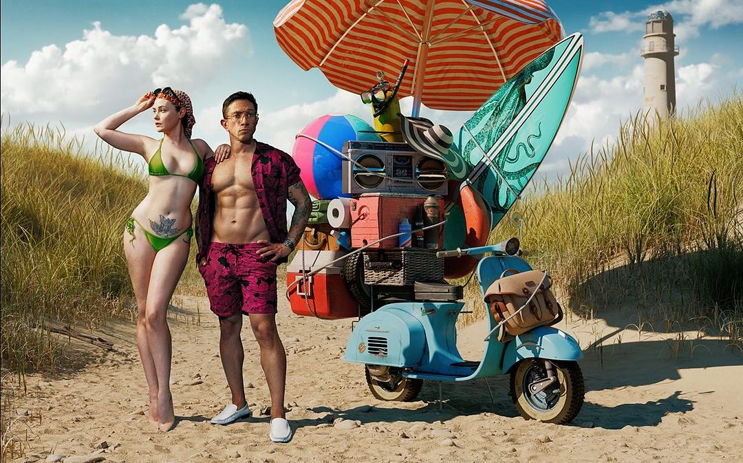 Tattooed couple poses on a beach with a blue scooter loaded with beach gear, including surfboard and striped sun umbrella, on a sunny day.