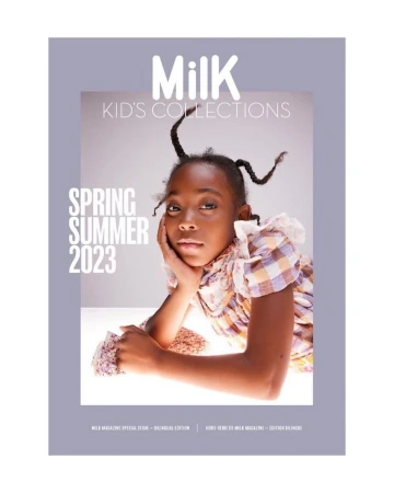 Magazine cover featuring a young Black girl with styled hair, posing in front of a grey background with white text overlay in portrait orientation.