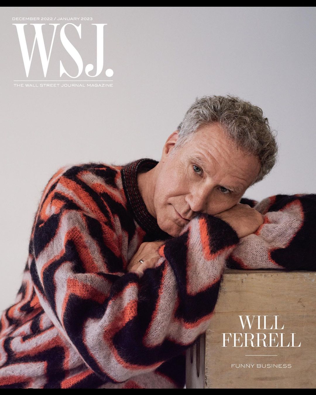 Magazine cover featuring Will Ferrell, wearing a patterned sweater, leaning on a wooden box with the Wall Street Journal logo visible.