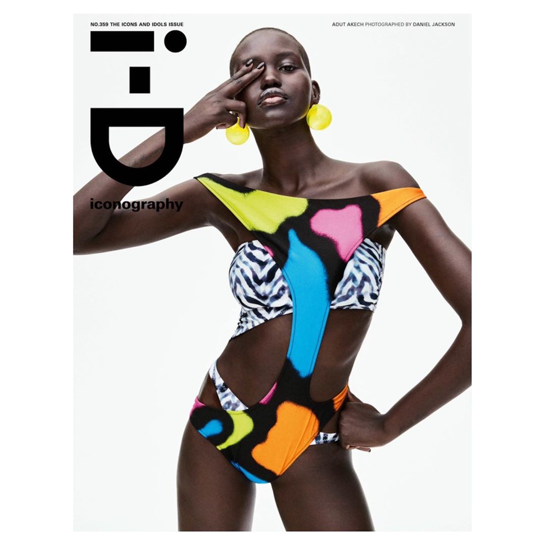 Magazine cover featuring a Black female model in colorful swimsuit striking pose. Editorial fashion shot for i-D magazine with geometric design.